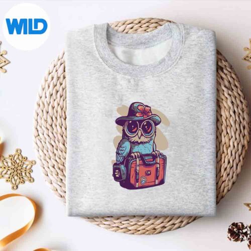 ChicTravelerBlueBirdWithHatAndGlassesSillyKeensweater