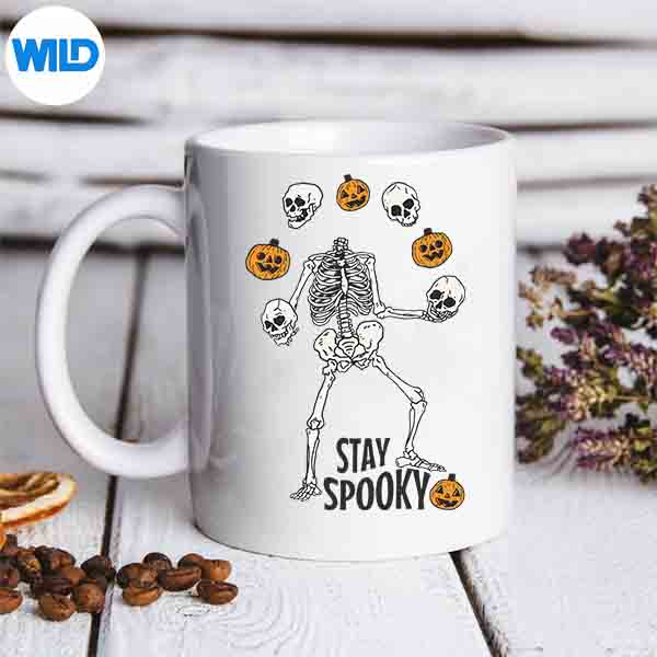 SkeletonJugglingSkullsPumpkinsHalloweenSpookyFunmug