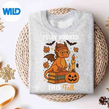 FullyBookedThisFallDragonReadingBookBookwormAutumnsweater