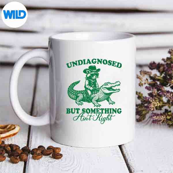 UndiagnosedButSomethingAintRightRaccoonAlligatormug