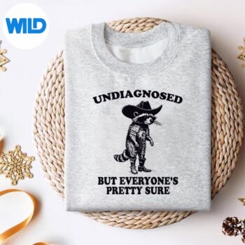 UndiagnosedButEveryonesPrettySureCowRaccoonsweater