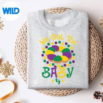 WeGotTheBabyPregnancyAnnouncementMardiGrassweater