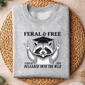 CuteFeralandFreeClassof2026FunnyRaccoonGraduationsweater.jpg